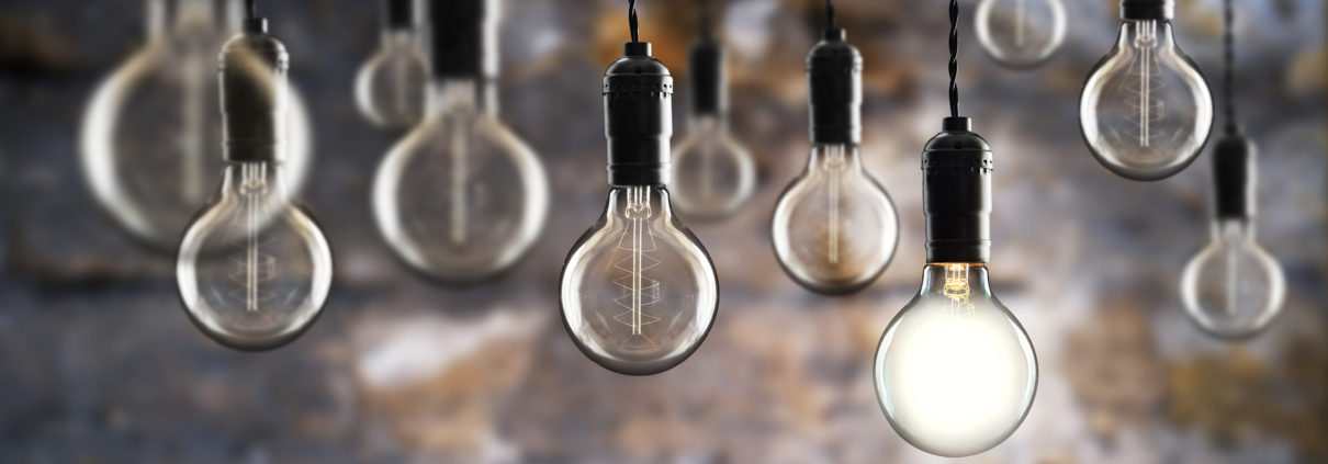 industrial themed light bulbs against masonry wall