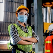 woman factory worker with hygienic mask during COVID19